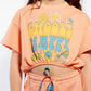 T-shirt cropped in cotone con stampa